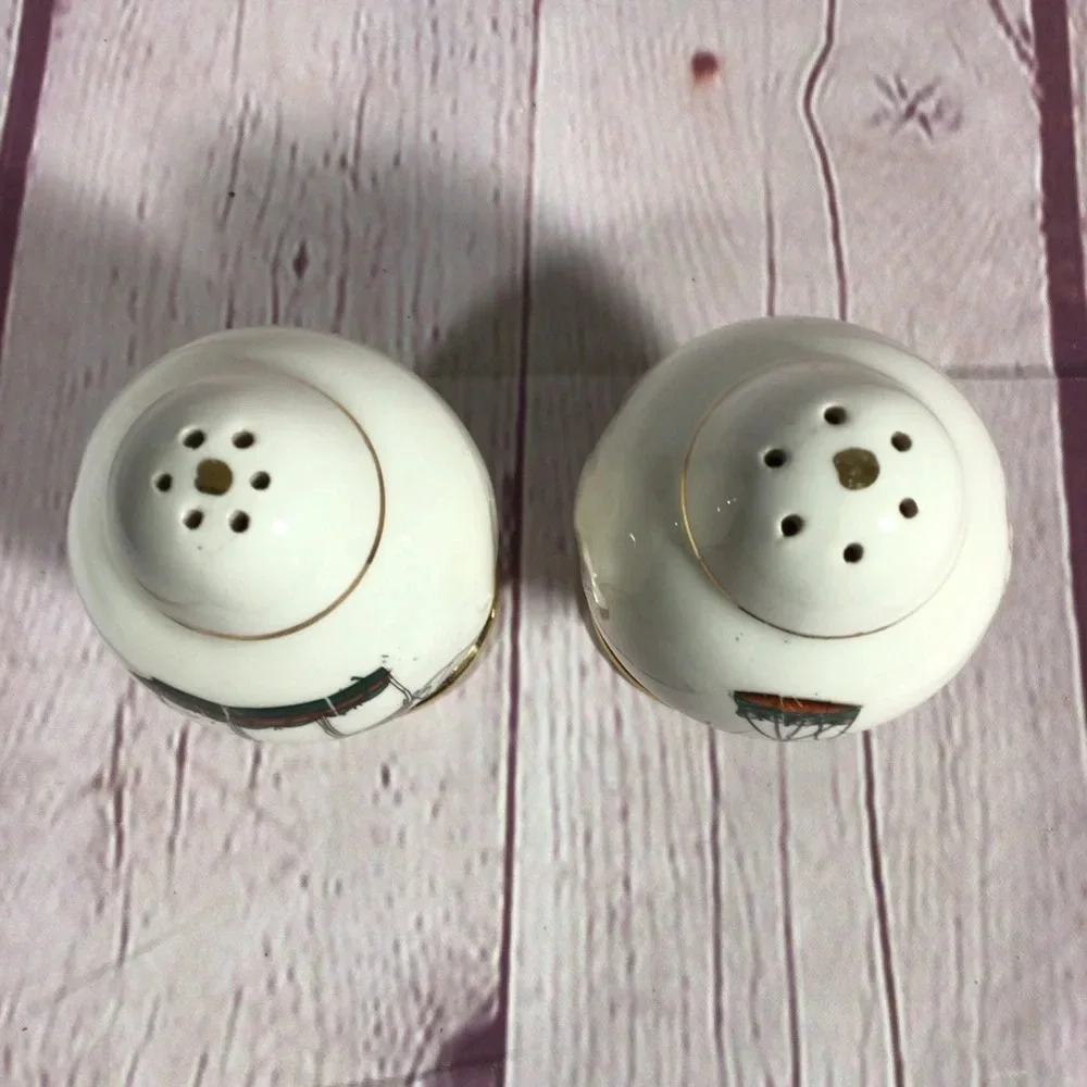 Vintage Porcelain Buggy Warranted 22 Karat Gold Salt and Pepper Shaker Pair